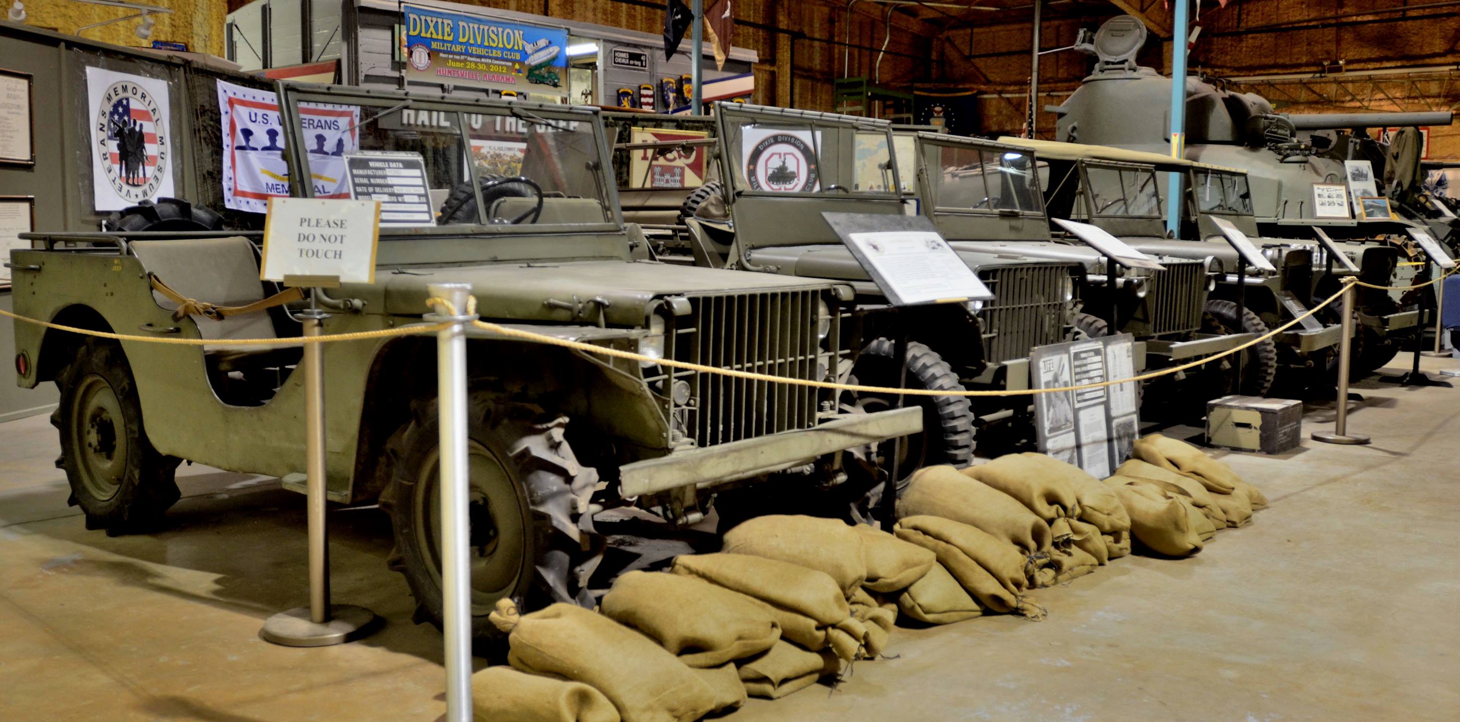 Historical military utility vehicle and restoration artifacts